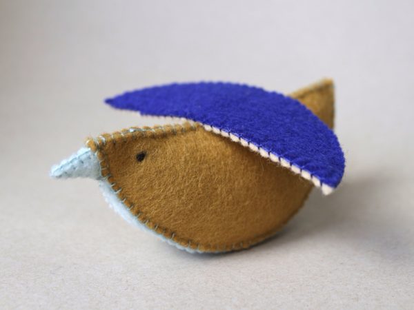 Rassel Vogel - piou piou - ocker und blau