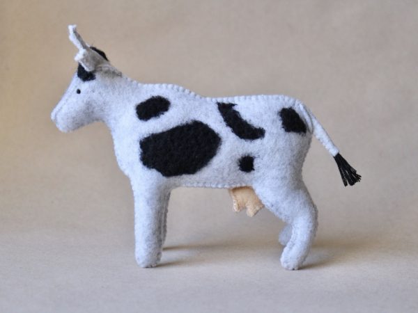 Black and white felt cow