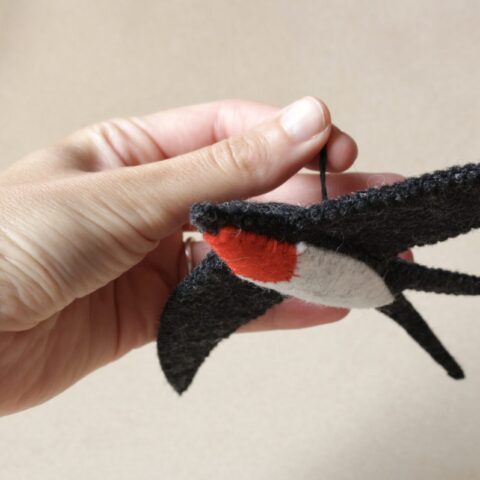 Swallow figurine to hang in wool felt