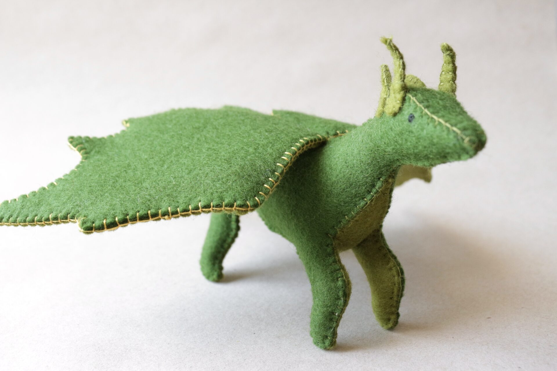 Large green felt dragon