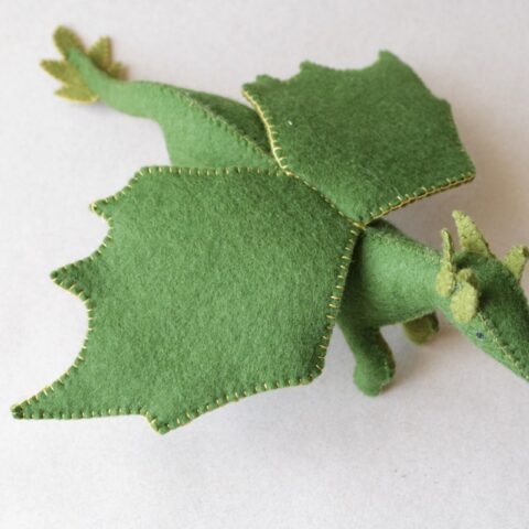 Green dragon figurine in organic wool