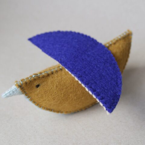 Bird rattle in ochre and blue natural wool felt