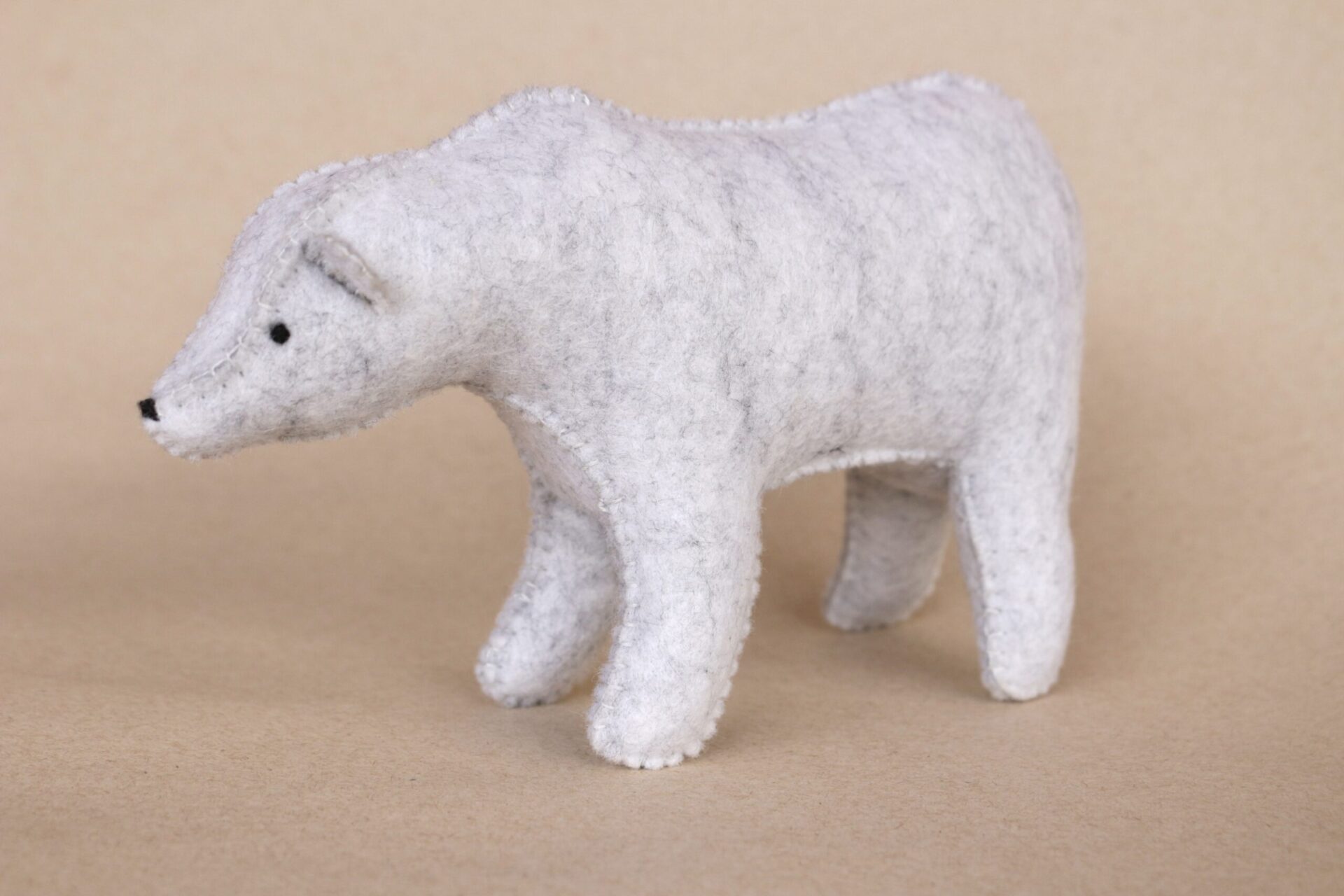 Wool felt polar bear toy